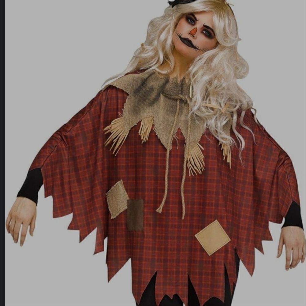 Womens scarecrow poncho. New. Never worn. One size fits most